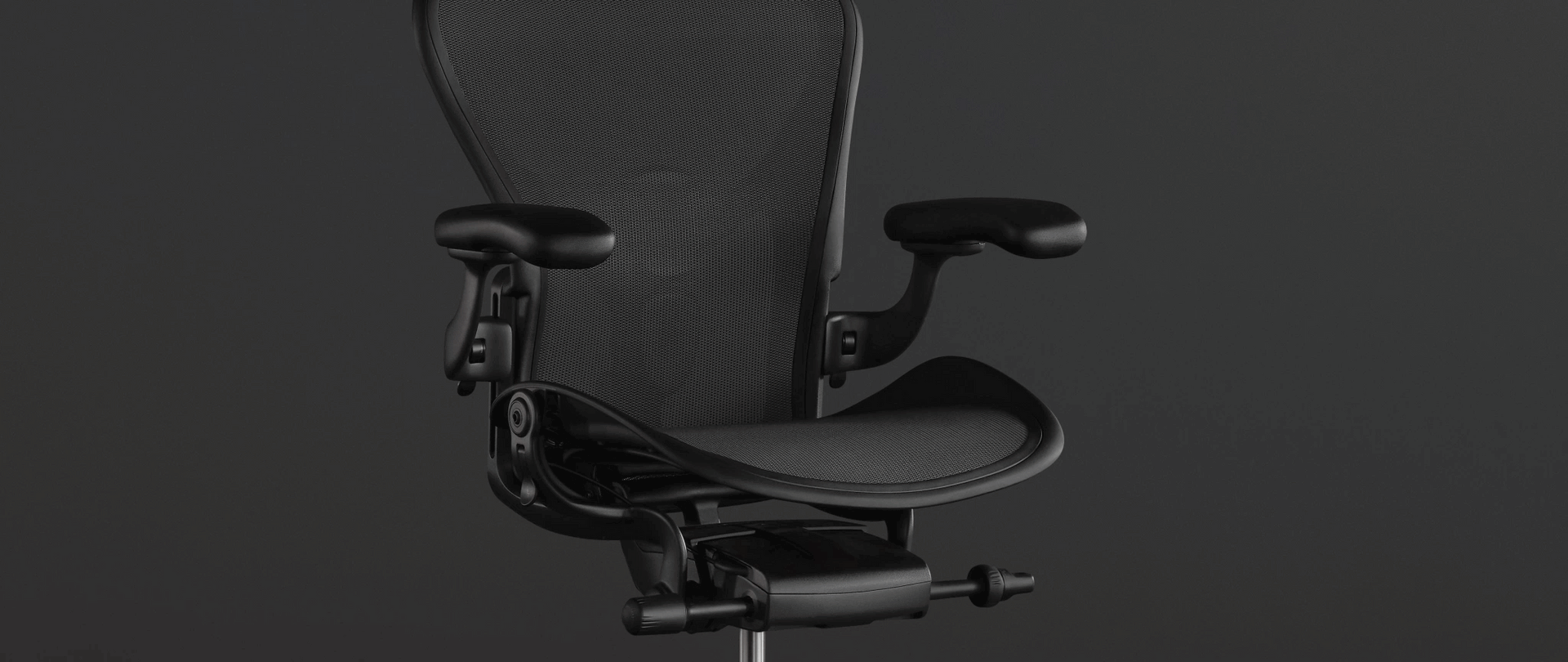 An animation highlights the PostureFit spinal support on the Embody Gaming Chair; the animation is overlaid on a photo of the chair on a black background.